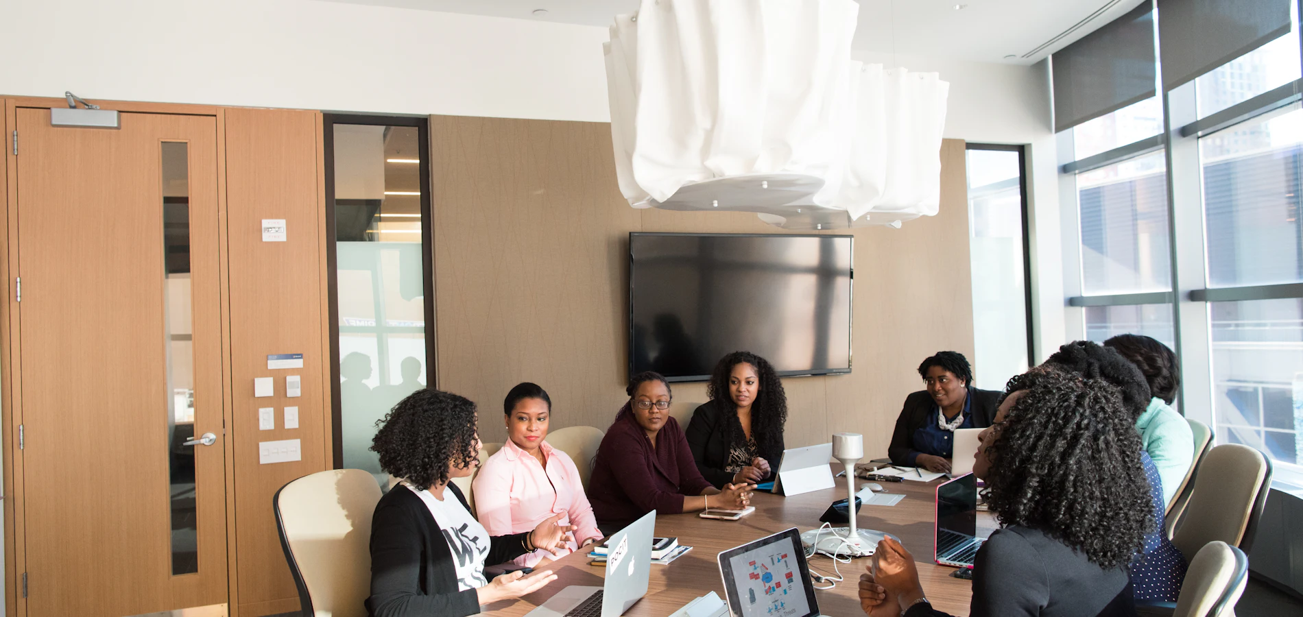 A team working together around a table in a bright office